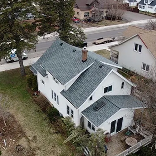 Aerial view of a completed asphalt shingle roof by Rhino Roofing